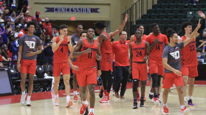 Dayton leaves the court after a victory against Miami in the first round of the ESPN Events Invitational on Thursday, Nov. 25, 2021, at the HP Fieldhouse in Kissimmee, Fla. David Jablonski/Staff