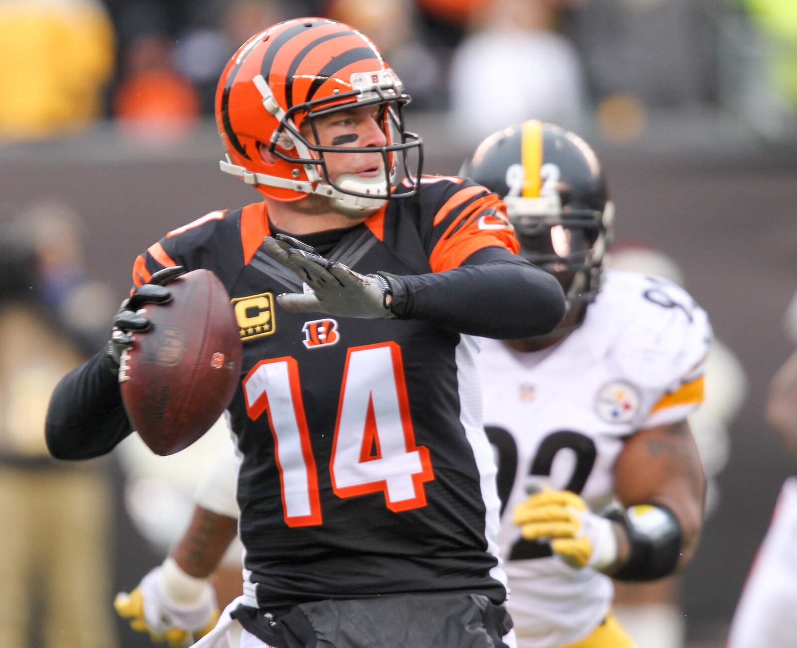 Bengals quarterback Andy Dalton (14) looks to complete a pass during their game against the Steelers at Paul Brown Stadium, Sunday, Dec. 18, 2016. GREG LYNCH / STAFF