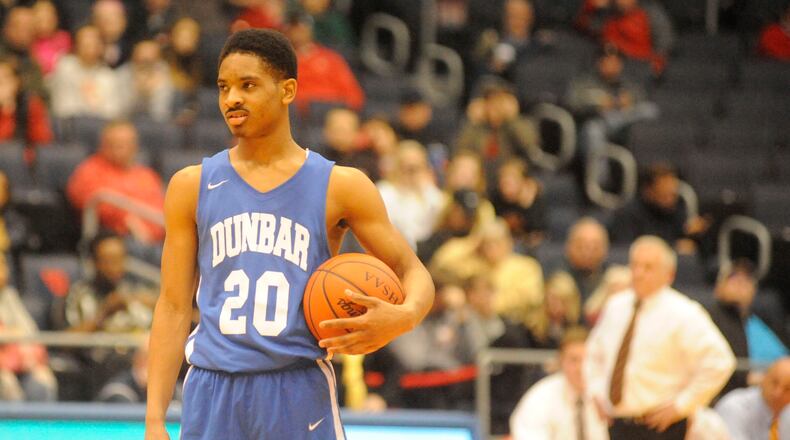 Dunbar, including Michael Elmore, held the ball for more than nine minutes of the second half in a 27-26 defeat of Fenwick in a boys high school basketball D-II sectional final at UD Arena on Wed., March 7, 2018. MARC PENDLETON / STAFF