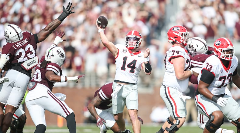 Georgia quarterback Gunner Stockton (14) throws a pass against Mississippi State during the first half of an NCAA college football game in Starkville, Miss., Saturday, Nov. 8, 2025. (AP Photo/James Pugh)