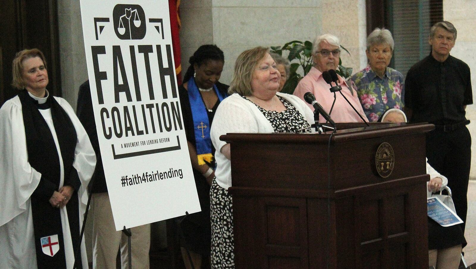 Springfield resident, Denise Cook Brooks tells her story dealing with the Pay Day Loan industry at the Ohio Statehouse Wednesday morning. JEFF GUERINI/STAFF