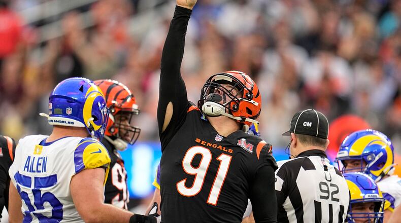 Cincinnati Bengals defensive end Trey Hendrickson (91) reacts after sacking Los Angeles Rams quarterback Matthew Stafford during the first half of the NFL Super Bowl 56 football game Sunday, Feb. 13, 2022, in Inglewood, Calif. (AP Photo/Marcio Jose Sanchez)