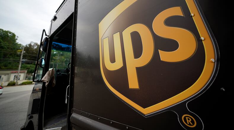 FILE - The UPS logo is displayed on the side of a delivery truck in Mount Lebanon, Pa., Sept. 21, 2021. (AP Photo/Gene J. Puskar, File)