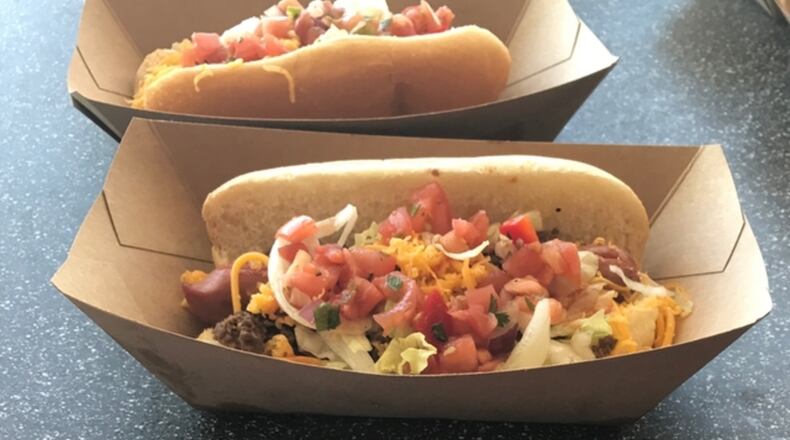 The Taco Dog: oozing with beef, cheddar, lettuce, pice de gallow and hot sauce, available in Great American Ball Park’s Porkopolis section. PHOTO: LIBBY CUNNINGHAM, WCPO.