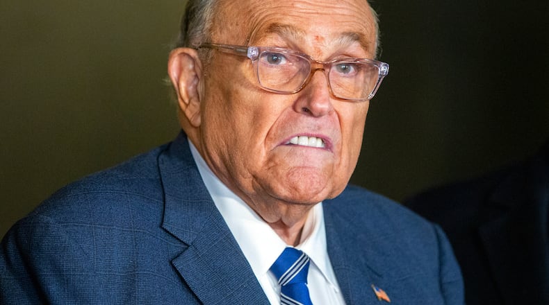 FILE - Rudy Giuliani speaks to the media outside Manhattan federal court in New York, Jan. 3, 2025. (AP Photo/Ted Shaffrey, File)