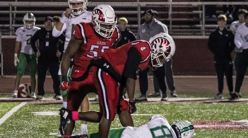 Trotwood-Madison's Caron Foster, Jr. celebrates a big hit during their game against Harrison on Friday night at Trotwood-Madison Stadium. The Rams won 49-0. HENRY S. CONTE / CONTRIBUTED PHOTO