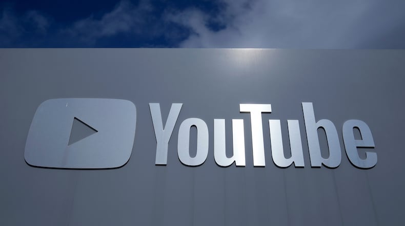 FILE - A YouTube sign is shown near the company's headquarters in San Bruno, Calif., Wednesday, March 12, 2025. (AP Photo/Jeff Chiu, file)