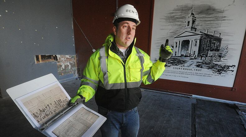 Ben Sutherly gives a tour Wednesday, Feb. 14, 2024 inside the controversial Troy Tavern building, which the Troy Historic Preservation Alliance is trying to save. MARSHALL GORBY\STAFF