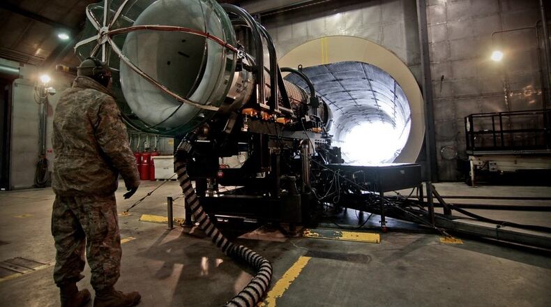 U.S. Air Force Tech. Sgt. Jim McNally checks over a General Electric F110 engine after a test run in 2013 at Atlantic City International Airport, N.J. The GE-F110 is used in the 177th Fighter Wing's F-16C Fighting Falcon aircraft. (U.S. Air Force photo/Tech. Sgt. Matt Hecht)