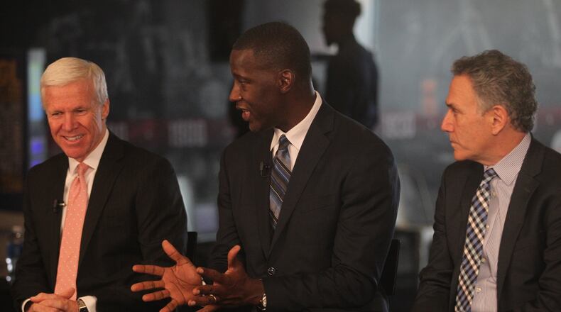 Dayton coach Anthony Grant, center, speaks at Atlantic 10 Media Day with Davidson coach Bob McKillop, left, and Duquesne coach Keith Dambrot on Tuesday, Oct. 17, 2017, at the Capital One Center in Washington, D.C. David Jablonski/Staff