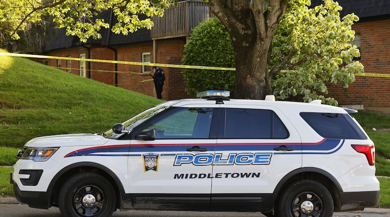 Investigators outside the Olde Towne apartments in Middletown after police said a standoff ended with exchanging gunfire with a suspect Monday afternoon | Nick Graham/Staff