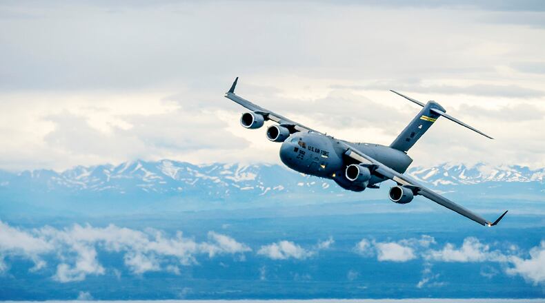 A C-17 Globemaster III based out of Joint Base Pearl Harbor-Hickam, Hawaii, and crewed by members of the 204th Airlift Squadron, participates in exercise Amalgam Dart on July 6 at Joint Base Elmendorf-Richardson, Alaska. This iteration of the exercise featured a variety of Air Force aircraft that operate out of the northern region. U.S. AIR FORCE PHOTO/MASTER SGT. MYSTI BICOY