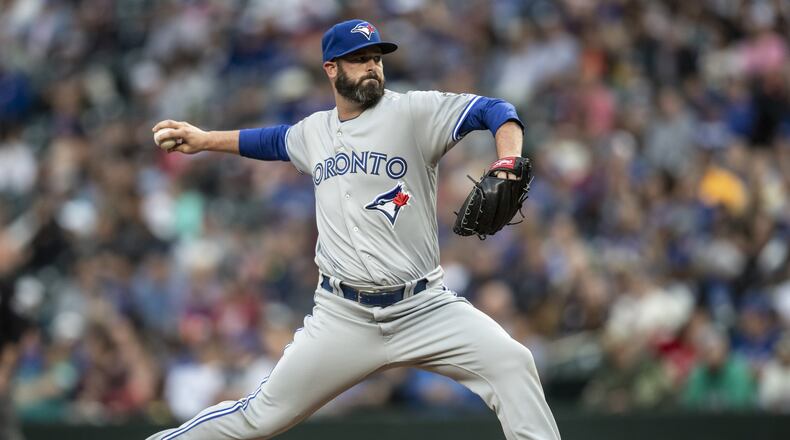 SEATTLE, WA - AUGUST 2: Reliever Mike Hauschild #44 of the Toronto Blue Jays delivers a pitch during the second inning of a game against the Seattle Mariners at Safeco Field on August 2, 2018 in Seattle, Washington. (Photo by Stephen Brashear/Getty Images)