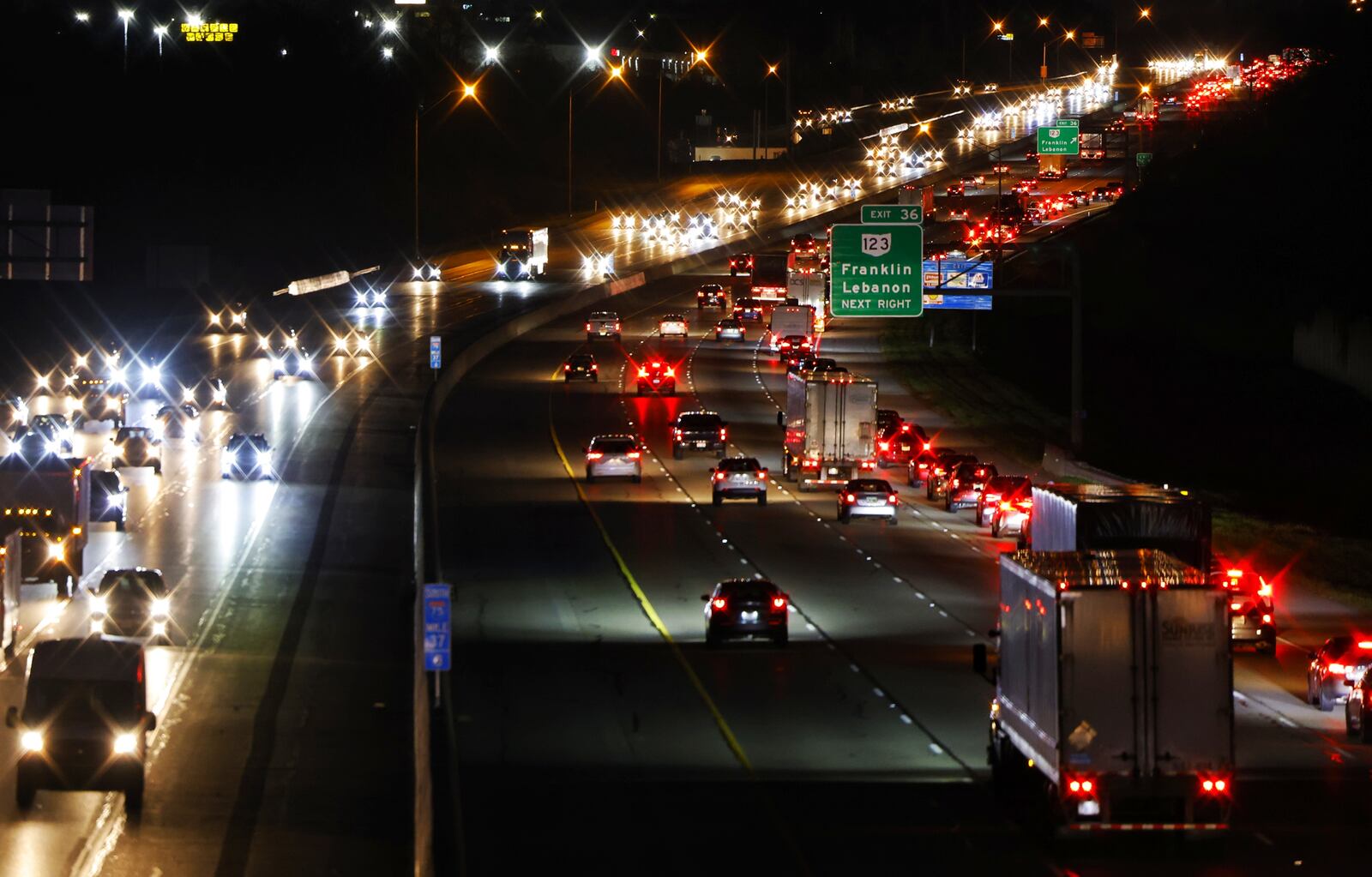 Vehicles travel along Interstate 75 in Franklin. More than 3.2 million Ohioans will travel 50 miles or more away from home for the Thanksgiving holiday this week, 2.1% more than last year. NICK GRAHAM / STAFF