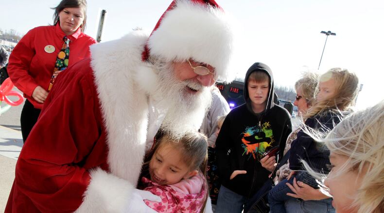 Santa Claus arrives at the Upper Valley Mall in Springfield. Staff photo