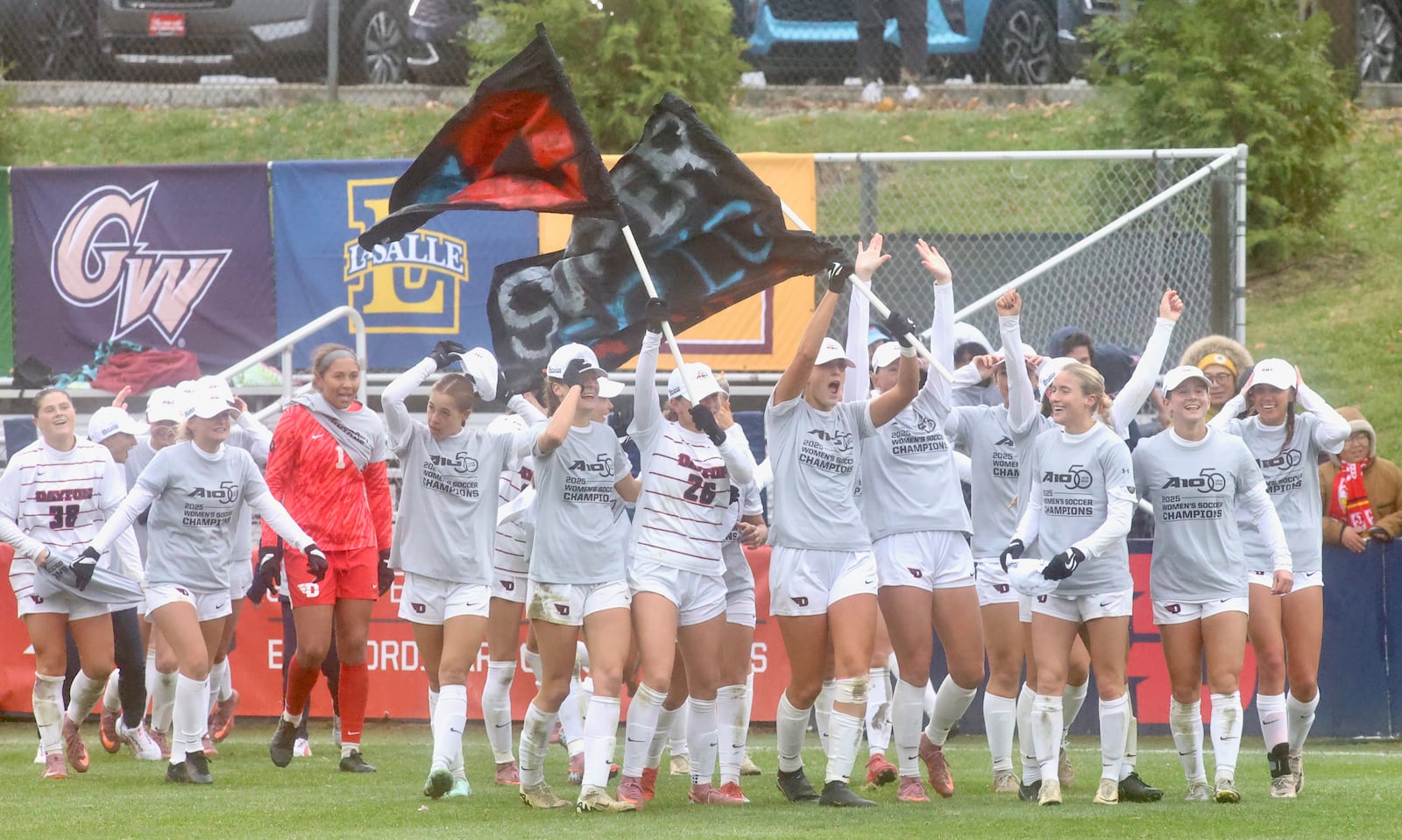 The Dayton women's soccer team celebrates a victory against Rhode Island in the Atlantic 10 Conference tournament championship game on Sunday, Nov. 9, 2025, at Baujan Field. David Jablonski/Staff