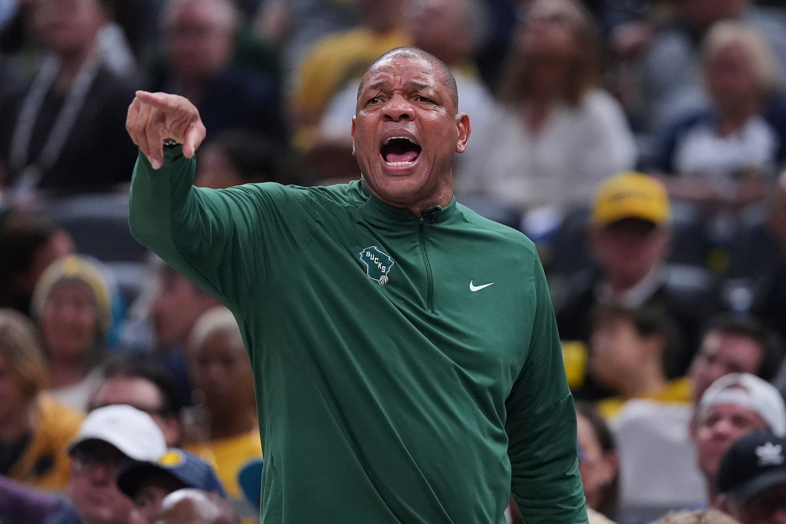 Milwaukee Bucks head coach Doc Rivers gestures during the first half of a first-round NBA basketball playoff game against the Indiana Pacers in Indianapolis, Tuesday, April 22, 2025. (AP Photo/Michael Conroy)