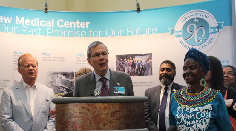 Kettering Health Network President Roy Chew discusses his organization’s discounted Gem City Market memberships for employees. Former Congressman and Ambassador Tony Hall and Mama Nozipo Glenn also spoke during Friday’s announcement. CORNELIUS FROLIK / STAFF