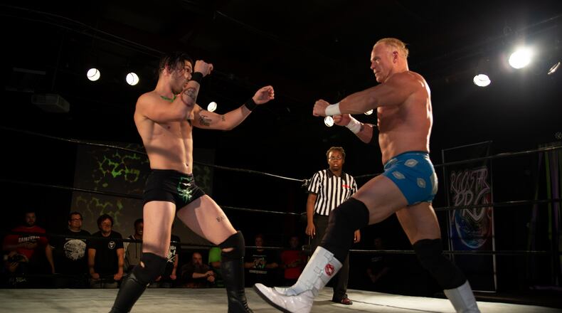 Zachary Wentz (left) and Bill Gunn are among the participants in Rockstar Pro Wrestling’s seventh anniversary wrestling match at Rockstar Pro Arena in Dayton on Friday, Feb. 1. CONTRIBUTED