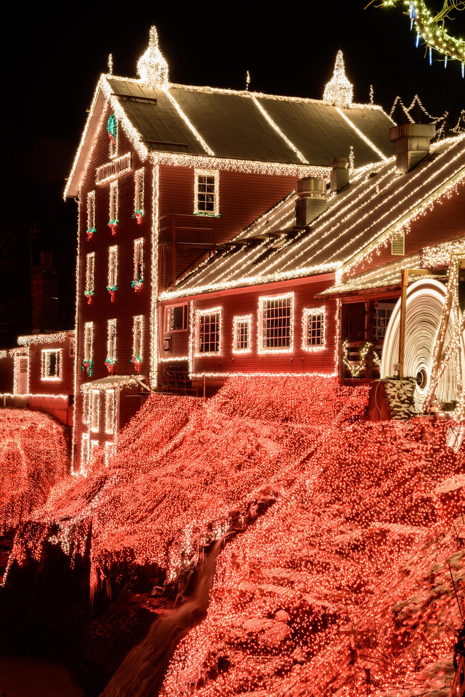 The historic Clifton mill, built in 1802 and still working, will open its Legendary Lights for the 2021 holiday season on Friday, Nov. 26. CONTRIBUTED/TOM GILLIAM