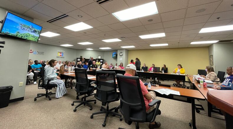 It was standing room only for audience members on Wednesday evening as mental and behavioral health providers, as well as family and community members, sat in on the board of trustees meeting for Montgomery County Alcohol, Drug Addiction and Mental Health Services (ADAMHS). The ADAMHS board approved funding reductions for a number of community agencies as it continues to decrease spending and adjust funding schedules. SAM WILDOW\STAFF