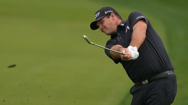 Patrick Reed of the United States plays his second shot on the 8th hole during the final round of the Dubai Desert Classic in United Arab Emirates, Sunday, Jan. 25, 2026. (AP Photo/Altaf Qadri)