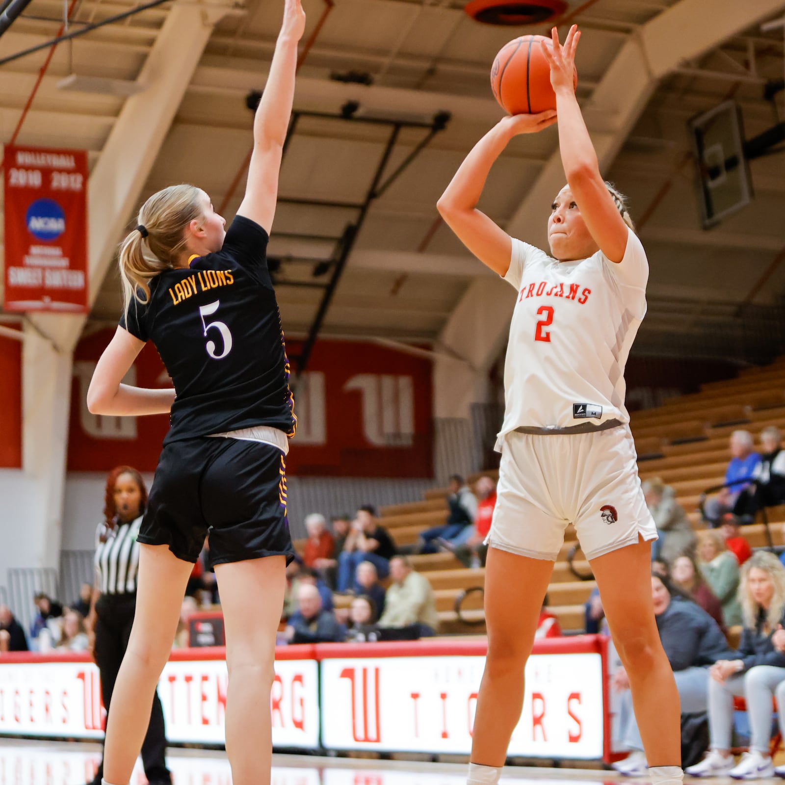 Southeastern senior Ryland Workman shoots over Emmanuel Christian sophomore Macey Hudson during their game on Tuesday, Dec. 31, 2025 at Wittenberg University's Pam Evans Smith Arena. MICHAEL COOPER / STAFF