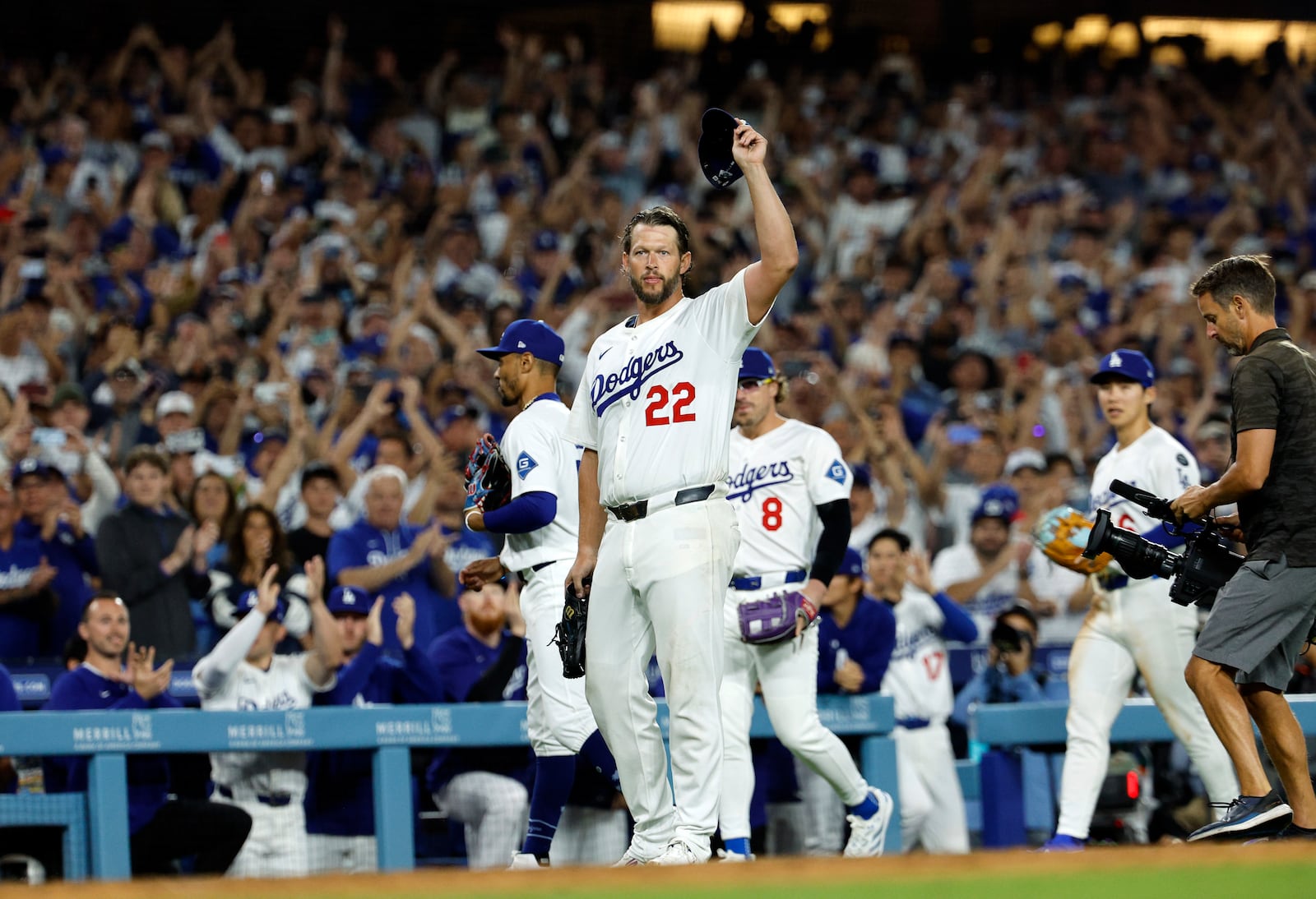 Los Angeles Dodgers pitcher Clayton Kershaw (22) tips his cap after striking out Chicago White Sox's Vinny Capra during the sixth inning for his 3,000th career strikeout Wednesday, July 2, 2025, in Los Angeles. (AP Photo/Kevork Djansezian)