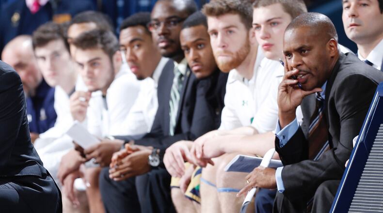 Anthony Solomon, far right, looks on from the Notre Dame bench during a game against Florida State on December 13, 2014 in South Bend, Indiana. (Photo by Joe Robbins/Getty Images)
