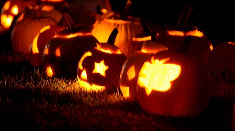 Hobson Freedom Park was filled with the flickering glow of 2,000 pumpkins for the annual Greene County Pumpkin Glow over the weekend on Friday, Oct. 25 and Saturday, Oct. 26. The family-friendly event included pumpkins carved to feature funny faces, cute animals and scary creatures, as well as a blacklight area for glow-in-the-dark fun. DAVID MOODIE / CONTRIBUTING PHOTOGRAPHER