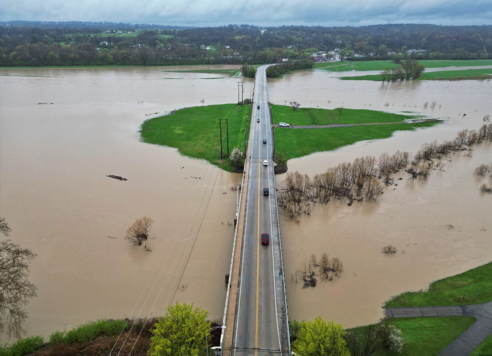 The level of the Great Miami River is up after several days of heavy rain Saturday, April 5, 2025 near the Ohio 122 bridge in Middletown. NICK GRAHAM/STAFF