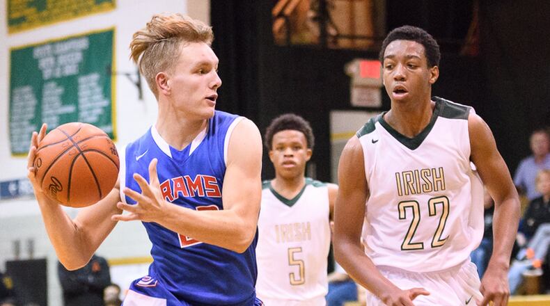 Greeneview’s Nick Clevenger dribbles with pressure from Catholic Central’s Sabien Doolittle during an Ohio Heritage Conference game on Tuesday night. BRYANT BILLING / CONTRIBUTED