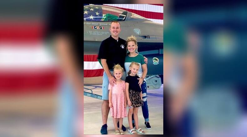 Franklin Mayor Brent Centers poses with his family next to an F-16 assigned to the 180th Fighter Group of the Ohio Air National Guard based in Toledo. Centers, who is a master sergeant in the Air Guard recently received orders to deploy for the sixth time in his 14-year career. Clockwise is Centers, his wife Corrina, daughters Reese and Quinn. CONTRIBUTED
