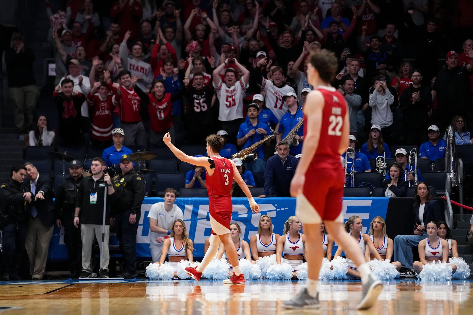 Miami (Ohio) guard Luke Skaljac (3) gestures to the crowd during the second half of a First Four college basketball game against SMU in the NCAA Tournament in Dayton, Ohio, Wednesday, March 18, 2026. (AP Photo/Jeff Dean)