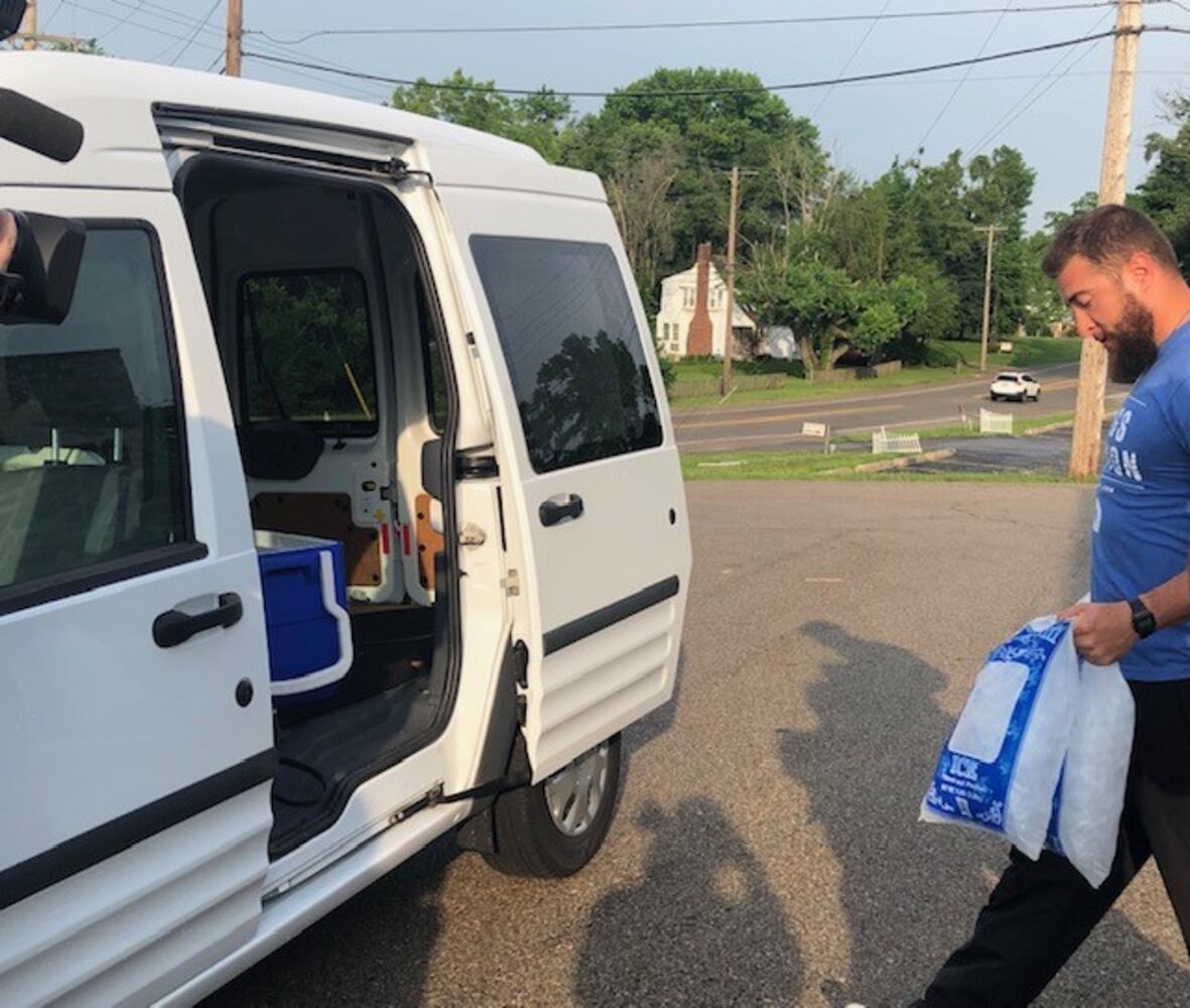 PHOTOS: People helping people after devastating tornadoes strike Miami Valley