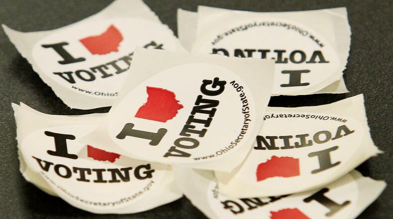 COLUMBUS, OH - NOVEMBER 6: Voting stickers lay on a table at the Kings Art Center November 6, 2012 in Columbus, Ohio. Recent polls show U.S. President Barack Obama and Republican presidential candidate, former Massachusetts Gov. Mitt Romney are locked in a tight race. (Photo by Jay LaPrete/Getty Images) ORG XMIT: 155697219