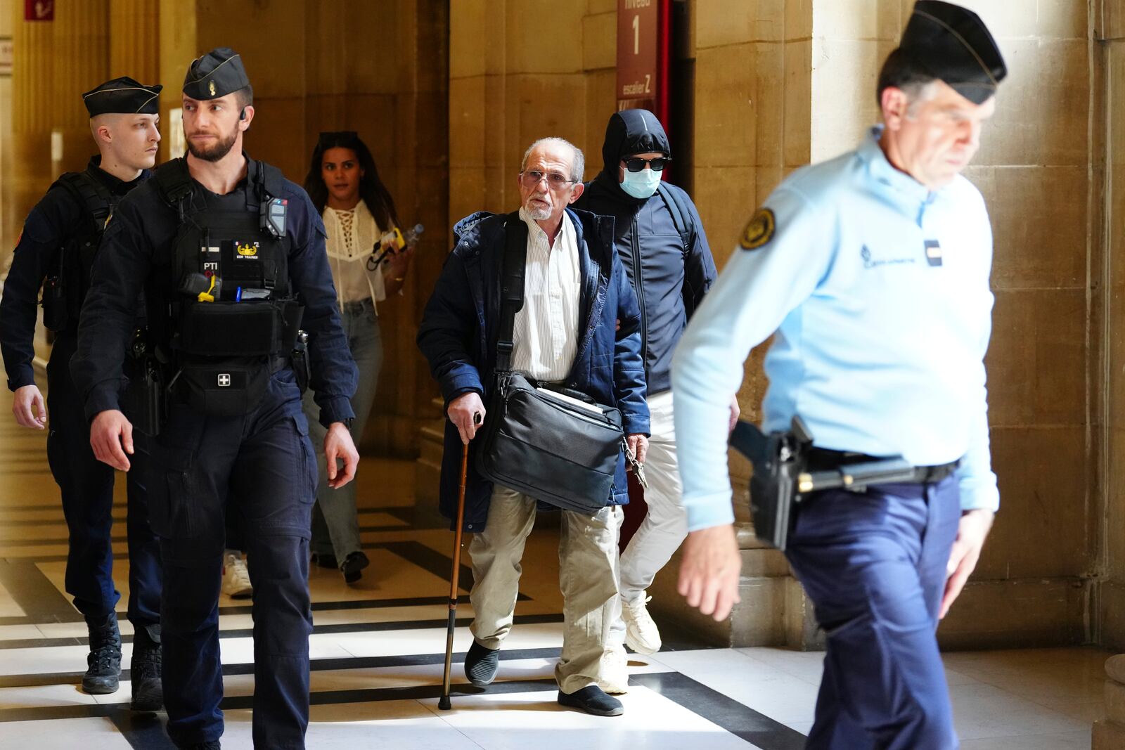 Defendant Aomar Aït Khedache, one of the men accused in the 2016 armed robbery of Kim Kardashian, arrives at the palace of justice Monday, April 28, 2025 in Paris. (AP Photo/Aurelien Morissard)