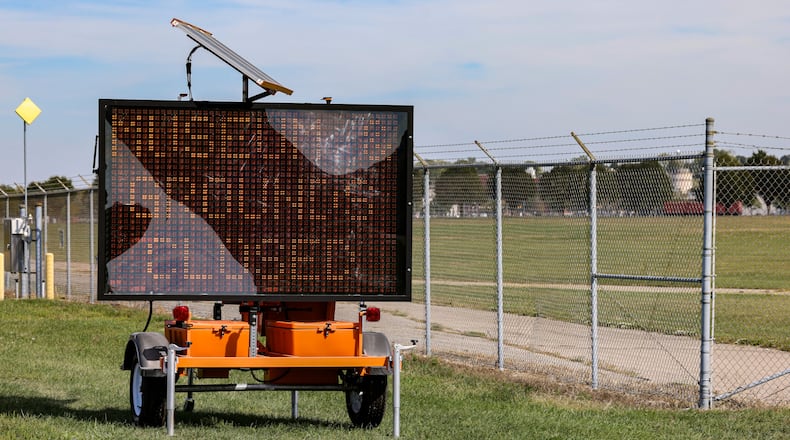 A sign on Springfield Street on Thursday, Oct. 2 displayed a message alerting visitors the National Museum of the United States Air Force is closed. The museum is closed due to the federal government shutdown. BRYANT BILLING / STAFF