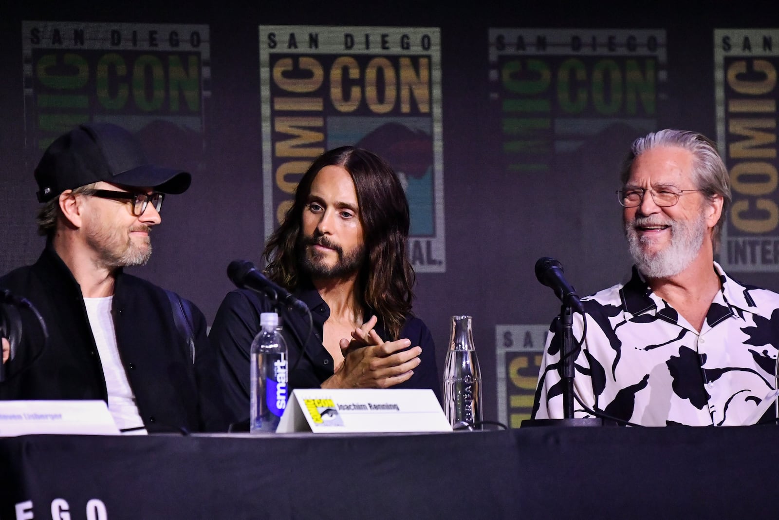Joachim Ronning, from left, Jared Leto, and Jeff Bridges attend a panel for "Tron: Ares" during Comic-Con International on Friday, July 25, 2025, in San Diego. (Photo by Richard Shotwell/Invision/AP)