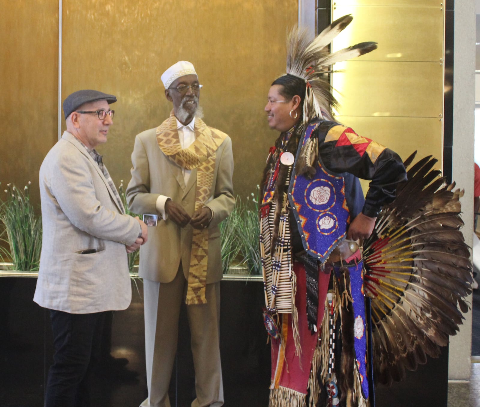 The 2017 Dayton Region's Walk of Fame induction ceremony at Sinclair Community College. David Boonshoft, the son of 2017 inductees Oscar and Marjorie Boonshoft, with Dayton artist Willis “Bing” Davis, a 2001 inductee, and Jason Bender of the Absentee Shawnee Tribe of Oklahoma. Bender help accept the honor for Shawnee Chief Tecumseh.