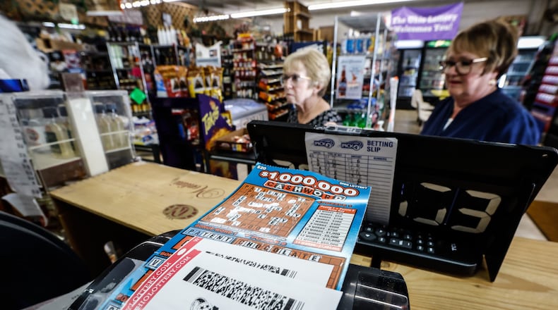 Mega Millions lottery sales are brisk at Bee-Gee's Mini Market on Bigger Road in Kettering on Thursday July 28, 2022. If there's a winner on Friday, the pre-tax payout will be over $1 billion. JIM NOELKER/STAFF