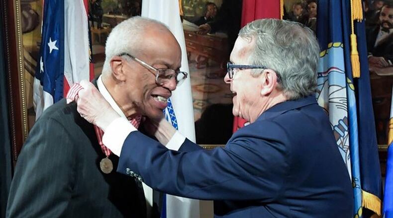 Ohio Gov. Mike DeWine presented the Ohio Distinguished Service Medal to Col. Guion Bluford, a retired U.S. Air Force officer, for his lifetime achievements in service to the state and the nation. CONTRIBUTED
