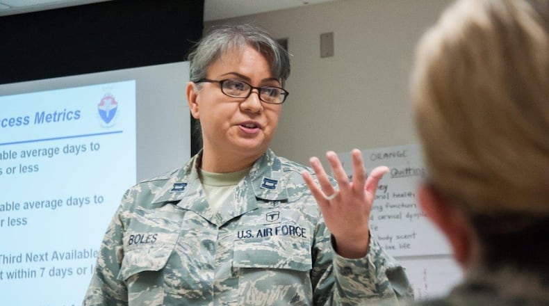 Capt. Marina Boles, Health Services Administration Medical Readiness Management course instructor, Joint Base San Antonio, Fort Sam Houston, conducts a training session during the second pilot of the Basic Leader Airman Skills Training course, held at the United States Air Force School of Aerospace Medicine at Wright-Patterson Air Force Base May 24. BLAST prepares mid-level total force Airmen to assume duties as Air Force Medical Service flight commanders, flight chiefs and medicals directors. (U.S. Air Force photo/John Harrington)
