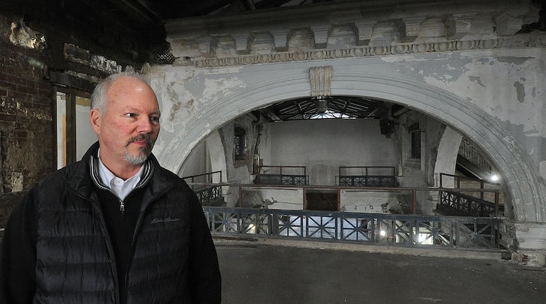 Dave Williams, of Cross Street Partners, talks about work being done on phase 2 of the Dayton Arcade. MARSHALL GORBY\STAFF