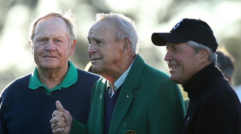 The legends of golf Jack Nicklaus, Arnold Palmer, and Gary Player take the tee box as the honorary starters to begin the Masters with Palmer giving the thumbs up at Augusta National Golf Club on Thursday, April 7, 2016, in Augusta. Curtis Compton / ccompton@ajc.com