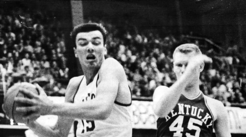 Hank Finkel (left) of the University of Dayton faces Kentucky in a 1966 NCAA tournament regional semifinal in Iowa City, Iowa. DAYTON DAILY NEWS FILE PHOTO