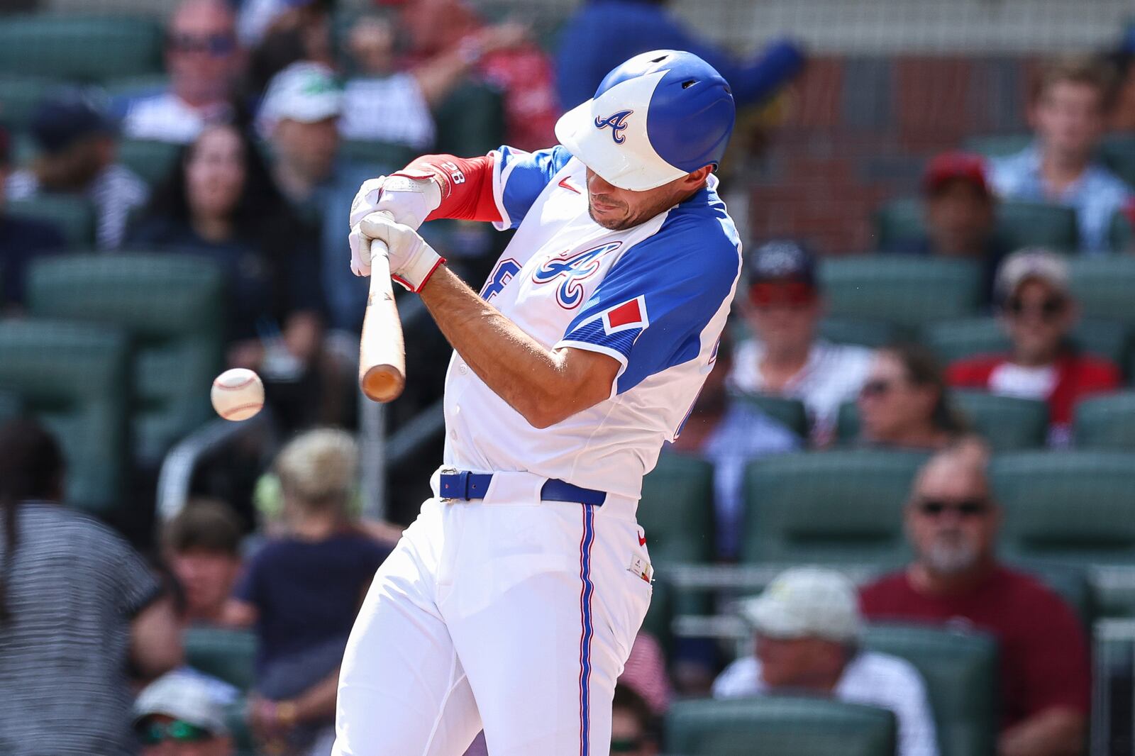 Atlanta Braves' Matt Olson hits a single in the first inning of a baseball game against the Colorado Rockies, Saturday, June 14, 2025, in Atlanta. (AP Photo/Colin Hubbard)