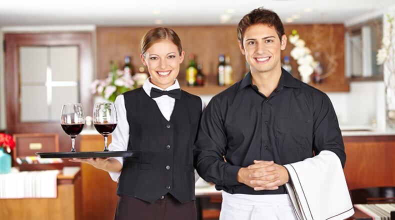 Whistling or snapping is not the best way to get your server's attention. (Dreamstime)