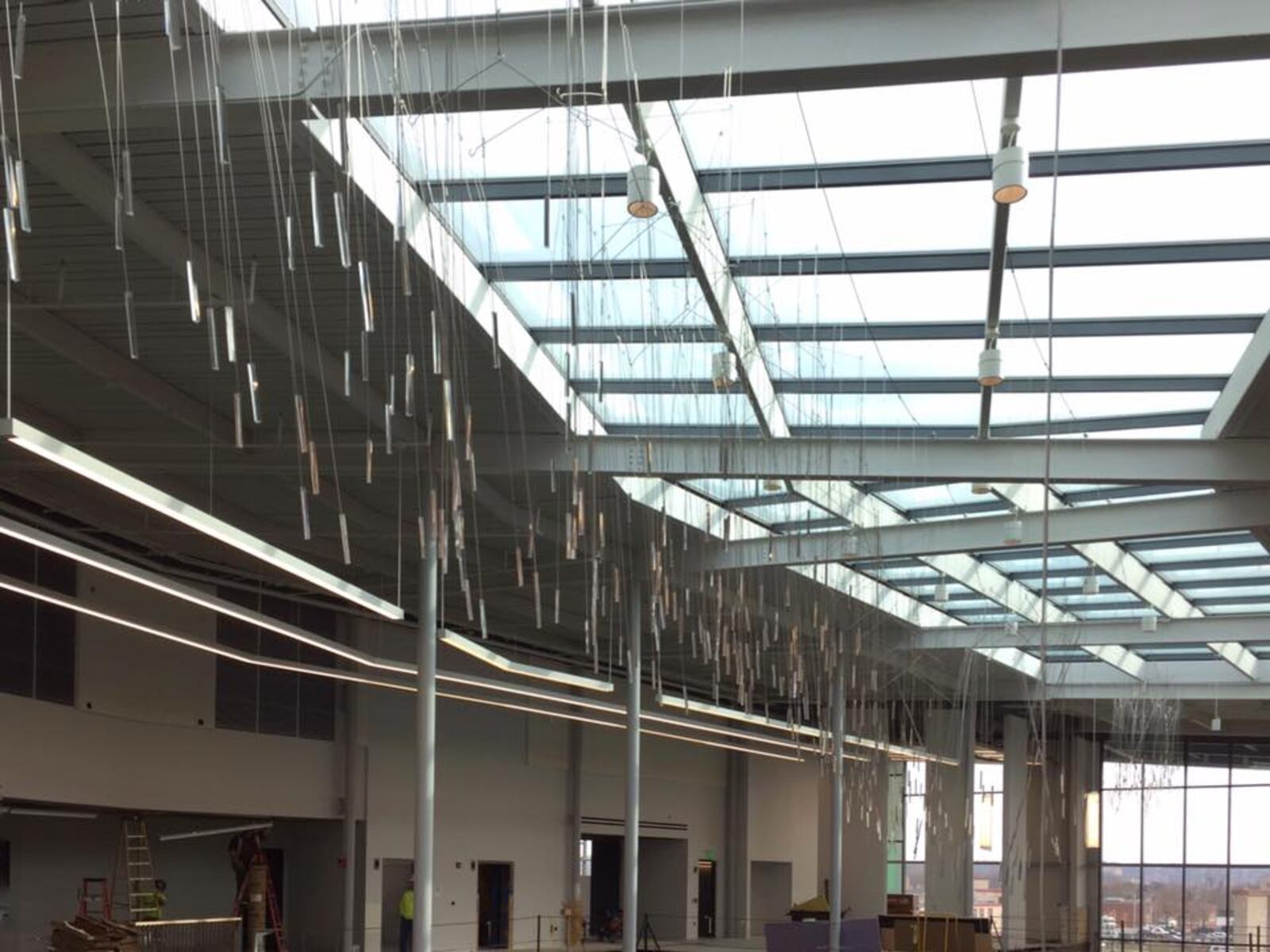 Architect Terry Welker has installed art designs to drape from the ceiling inside the new downtown Dayton Library. The fractal rain looks jaw dropping coming from the windows that make up the ceiling. Welker says, "Approximately 15% complete."