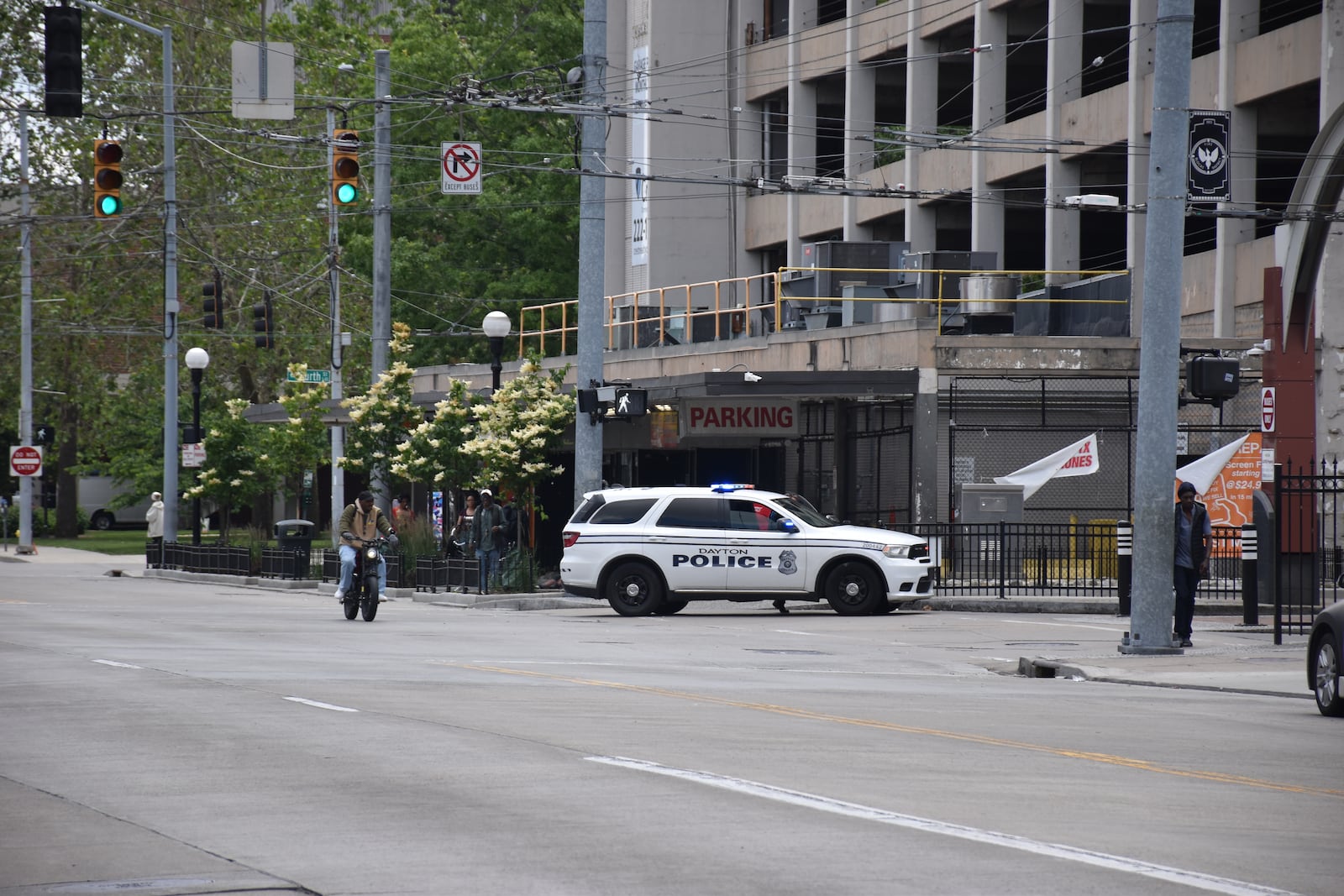 Dayton police respond to Wright Stop Plaza (the downtown bus hub) on first block of South Jefferson Street. People often hang out in front of the businesses near the bus hub that are in the ground floor commercial spaces of the Air City parking garage. CORNELIUS FROLIK / STAFF